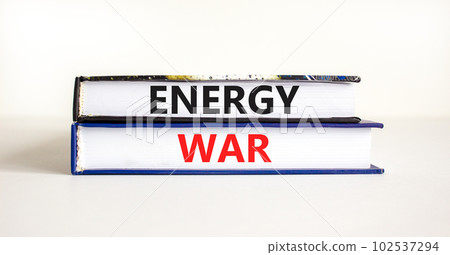 Energy war symbol. Concept words Energy war on beautiful books. Beautiful white table white background. Business and Energy war concept. Copy space. Energy war symbol. Concept words Energy war on beautiful books. Beautiful white table white background. Business and Energy war concept. Copy space. 102537294