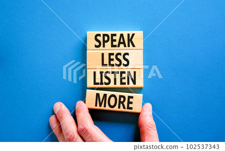 Speak less listen more symbol. Concept words Speak less listen more on wooden block. Beautiful blue table blue background. Motivational business speak less listen more concept. Copy space. Speak less listen more symbol. Concept words Speak less listen more on wooden block. Beautiful blue table blue background. Motivational business speak less listen more concept. Copy space. 102537343