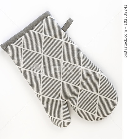 Gray oven glove on a white background. Kitchen potholder. Gray oven glove on a white background. Kitchen potholder. 102538243
