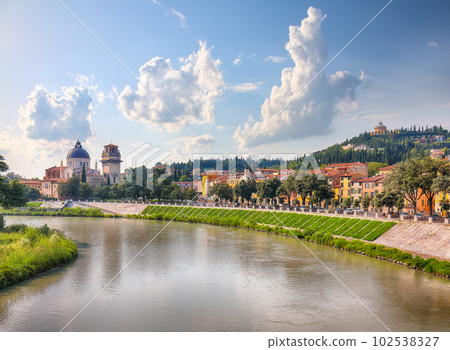 Fabulous  Verona cityscape view on the riverside with historical buildings and towers. 102538327