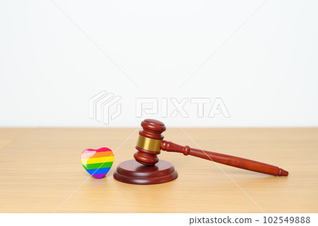 LGBT Law and Pride month concepts. gavel justice hammer with rainbow colorful heart shape for Lesbian, Gay, Bisexual, Transgender, Queer, Intersex, Asexual, Agender, Non Binary, Two Spirit, Pansexual LGBT Law and Pride month concepts. gavel justice hammer with rainbow colorful heart shape for Lesbian, Gay, Bisexual, Transgender, Queer, Intersex, Asexual, Agender, Non Binary, Two Spirit, Pansexual 102549888