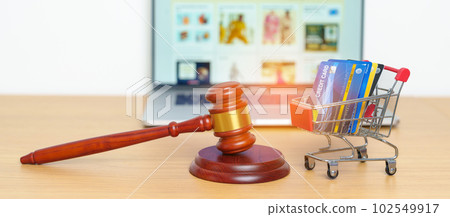 Judge gavel, shopping cart, Credit Card and laptop. online auction and bidding, Trade Regulations, Consumer protection Law, online shopping, E commerce, Tax, Digital, justice and judgment concept Judge gavel, shopping cart, Credit Card and laptop. online auction and bidding, Trade Regulations, Consumer protection Law, online shopping, E commerce, Tax, Digital, justice and judgment concept 102549917