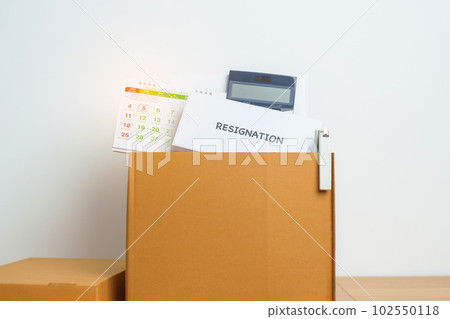 Resignation, Layoff, Unemployment, Dismiss, Job quit, Jobless and Farewell concept. letter of Resign contract with documents cardboard box at office Resignation, Layoff, Unemployment, Dismiss, Job quit, Jobless and Farewell concept. letter of Resign contract with documents cardboard box at office 102550118