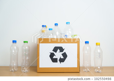 Plastic bottle in paper box at home or office. Recycle garbage Sorting. Plastic Free, Ecology, Environmental, pollution, Dispose recycling, waste management and trash Separation concept Plastic bottle in paper box at home or office. Recycle garbage Sorting. Plastic Free, Ecology, Environmental, pollution, Dispose recycling, waste management and trash Separation concept 102550498