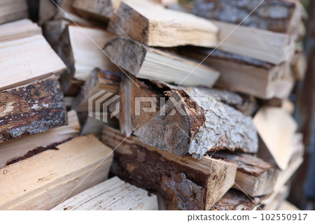 Stack of chopped wood logs for bonfire Stack of chopped wood logs for bonfire 102550917