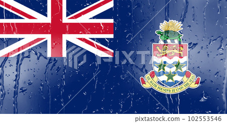 3D Flag of Cayman Islands on a glass with water drop background. 3D Flag of Cayman Islands on a glass with water drop background. 102553546