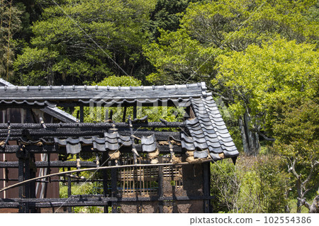 Japanese one-story wooden house burned by fire Japanese one-story wooden house burned by fire 102554386