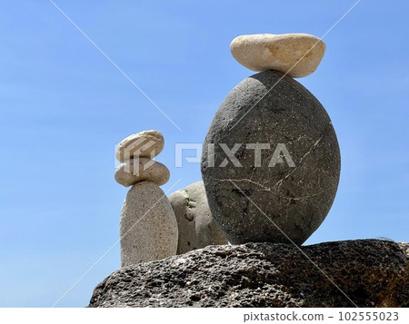 stone sculpture on the blue sky background stone sculpture on the blue sky background 102555023