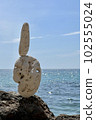 Stone sculpture on the background of the sea 102555024