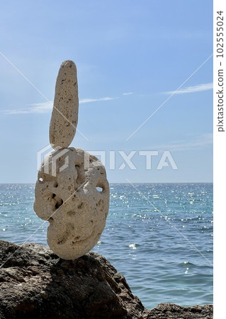 Stone sculpture on the background of the sea Stone sculpture on the background of the sea 102555024