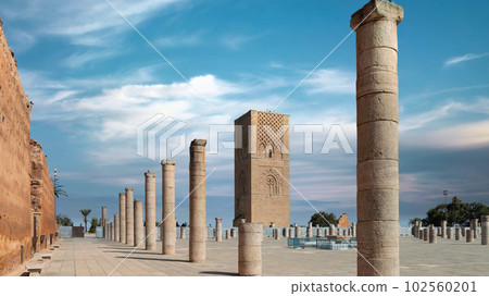 Rabat, Morocco - September 2022: Hassan tower at Mausoleum of Mohammed V, built to honor the memory of the late King Mohammed V during sunset. 102560201