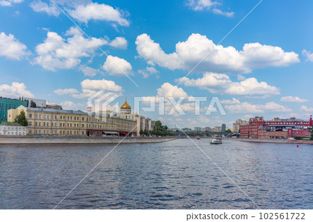 Cruise ship sails on the Moscow river in Moscow city center, popular place for walking. 102561722