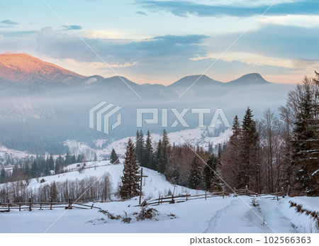 Sunrise winter Carpathian mountain village, Ukraine 102566363