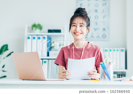 A young female engineer in the office 102566930