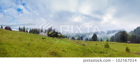 Dense fog over summer mountains. Carpathians, Ukraine. Dense fog over summer mountains. Carpathians, Ukraine. 102567014