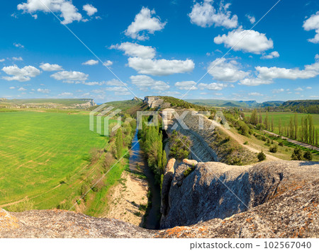 Spring Crimea Mountain landscape with rocks and river (Ukraine). 102567040