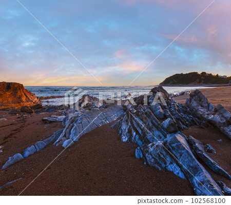 Sunrise ocean view from beach (Bay of Biscay). 102568100