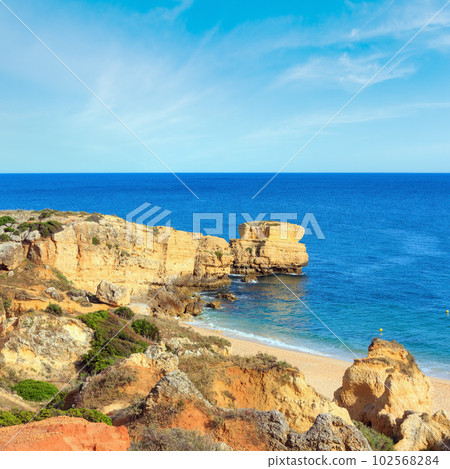 Atlantic rocky coast view (Algarve, Portugal). Atlantic rocky coast view (Algarve, Portugal). 102568284