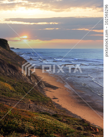Evening ocean beach (Algarve, Portugal). 102568296