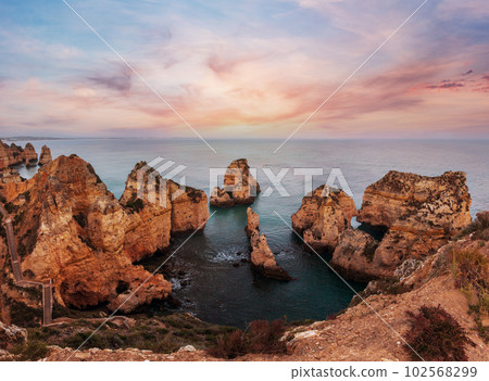 Evening Ponta da Piedade landscape (along coastline of Lagos town, Algarve, Portugal). 102568299