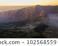 Small town on the hill with sunlight. 102568559