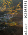 Small town on the hill with sunlight. 102568561