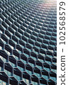 Facade of the office building was designed in beehive. 102568579