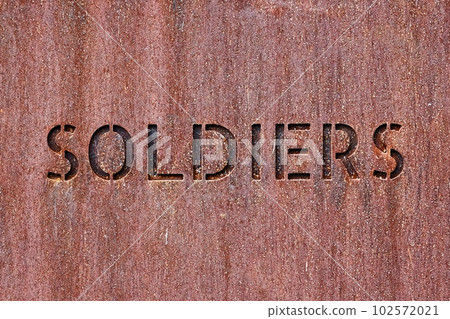 Soldiers word writen on metal plaque Soldiers word writen on metal plaque 102572021