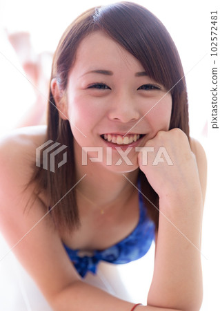 girl in a swimsuit girl in a swimsuit 102572481