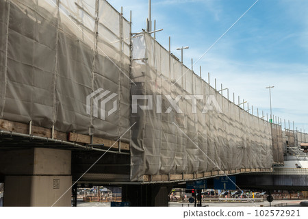 Expressway bridge repair work and suspended scaffolding Expressway bridge repair work and suspended scaffolding 102572921