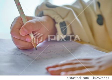 Child with a pencil Handwriting practice Hard writing 002 Child with a pencil Handwriting practice Hard writing 002 102574434