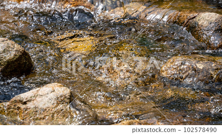 Mountain stream water flow Mountain stream water flow 102578490