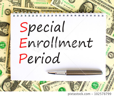 SEP symbol. Concept words SEP Special enrollment period on beautiful white note. Dollar bills. Beautiful background from dollar bills. Medical and SEP Special enrollment period concept. Copy space. 102578799