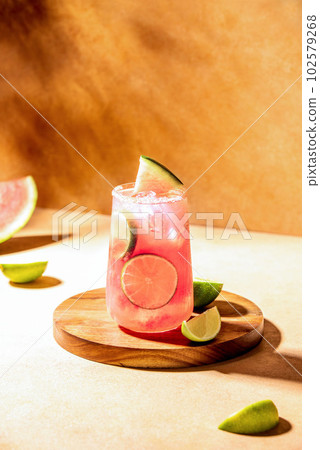 Watermelon vodka limeade, pink summer long drink cooler Watermelon vodka limeade, pink summer long drink cooler 102579268