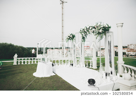 Interior of a restaurant prepared for wedding ceremony 102580854