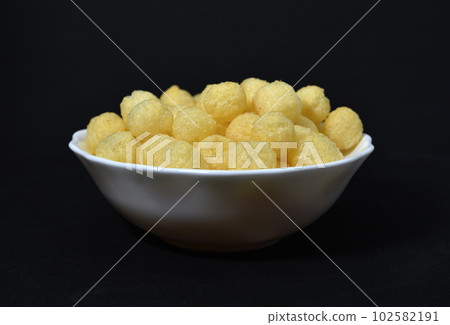 Corn chips with salt for beer. Delicious corn snack. 102582191