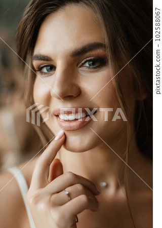 bride's preparations for a wedding in a cottage bride's preparations for a wedding in a cottage 102588067
