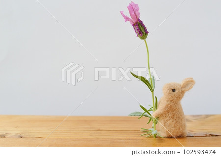 Felt rabbit with French lavender flowers Felt rabbit with French lavender flowers 102593474