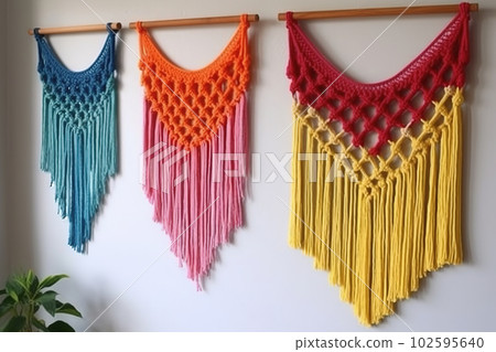 DIY macrame wall hanging. Boho style colorful interior decor. Generative AI DIY macrame wall hanging. Boho style colorful interior decor. Generative AI 102595640
