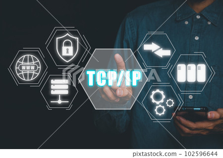 TCP IP, Network data transmission model concept, Person hand using smartphone and hand touching tcp ip icon on virtual screen. 102596644