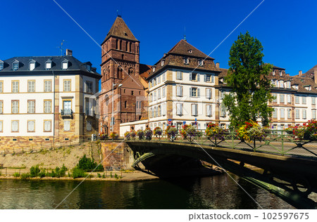 Strasbourg cityscape overlooking St Thomas Church on bank of Ill river Strasbourg cityscape overlooking St Thomas Church on bank of Ill river 102597675