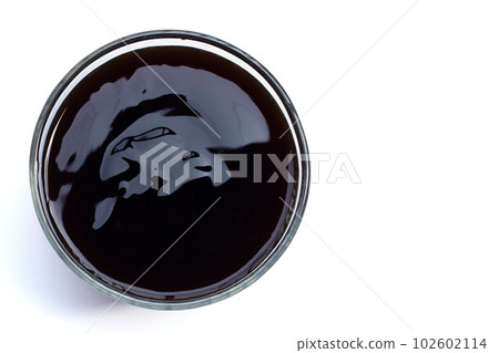 Oyster sauce on white background. Oyster sauce on white background. 102602114