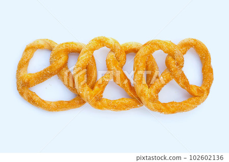 Soft pretzels on a white background. 102602136