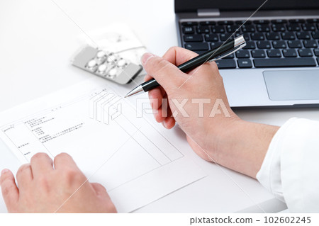Hand of pharmacist checking prescription. Medicine and medical fees, receipt computer image 102602245