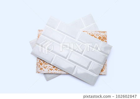 Pile of wall tiles on white background. 102602847