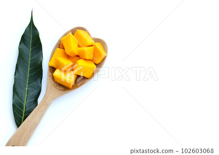 Mango cube slices on white background. 102603068
