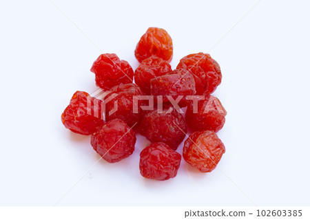 Dried red plum. Preserved fruit Dried red plum. Preserved fruit 102603385