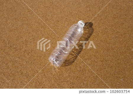 Plastic bottle on the beach Plastic bottle on the beach 102603754