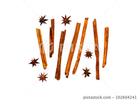 Star anis and cinnamon sticks on white 102604241