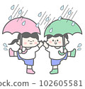 Rainy season Two toddlers playing with umbrellas in the rain 102605581